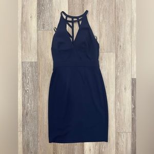Laundry brand cocktail dress. Deep V-neck navy blue beaded detail on back